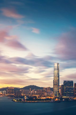 香港の夕暮れの超高層ビルシティベイのiPhone5壁紙
